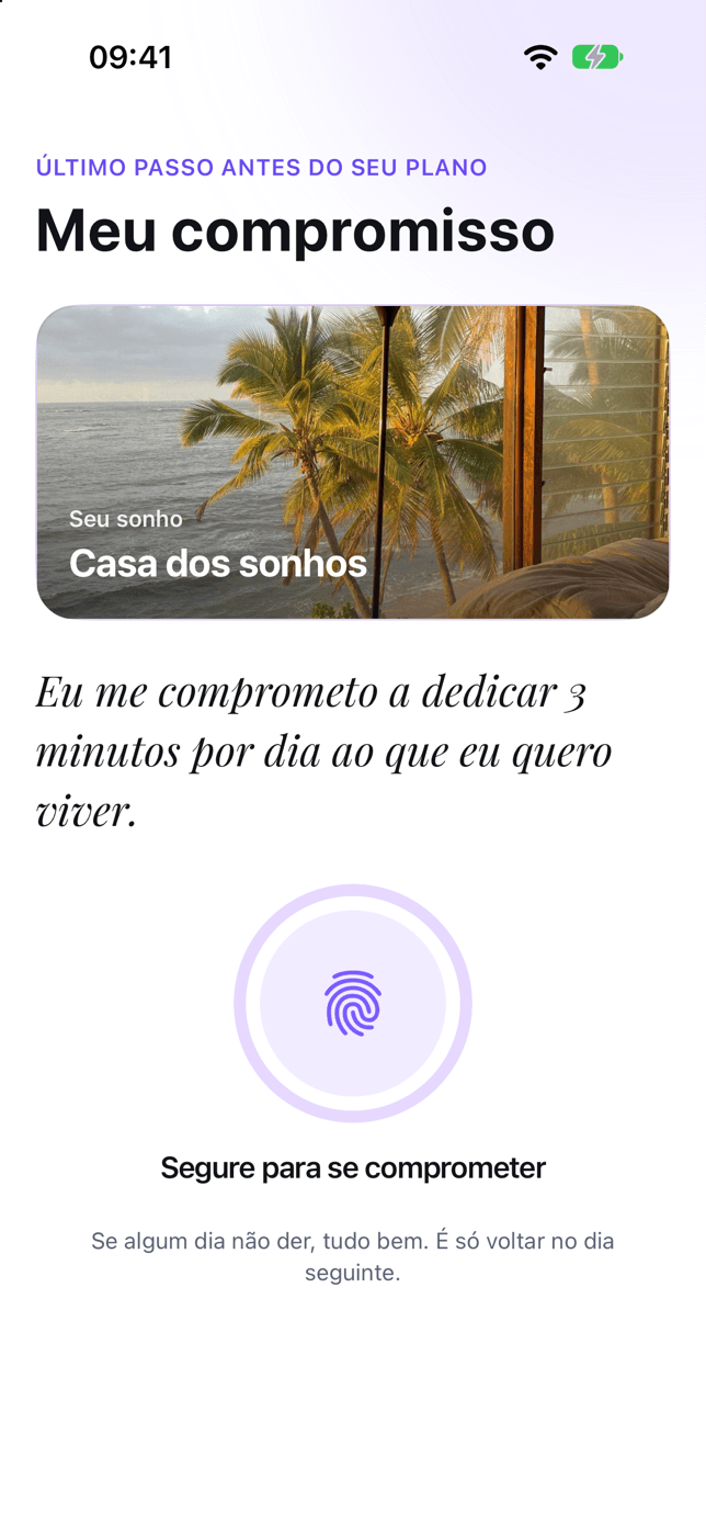 Onboarding, “Meu compromisso”: a foto do sonho, a frase “Eu me comprometo a dedicar 3 minutos por dia ao que eu quero viver.” e o botão de segurar para se comprometer.